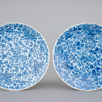 A pair of blue and white Chinese porcelain peony scroll dishes, Kangxi, 18th C.