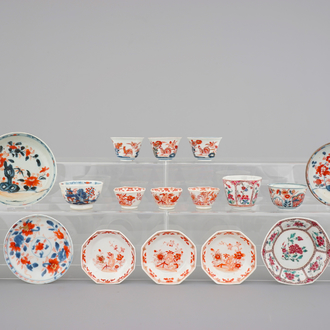 A large collection of Chinese famille rose, iron red and imari cups and saucers, 18th C.