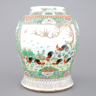 A Chinese famille rose porcelain vase with a peacock, 19th C.