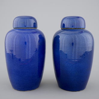 A pair of Chinese powder blue jars with covers, early 19th C.