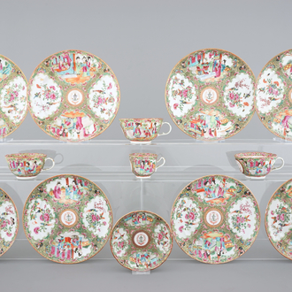 A lot of 8 Chinese Canton rose medallion armorial plates, 4 cups and a saucer, 19th C.