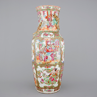 A tall Chinese Canton rose medallion vase with swirled mouth, 19th C.