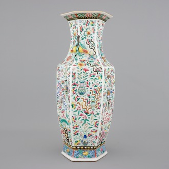 A Chinese hexagonal relief-decorated famille rose porcelain vase, 19th C.