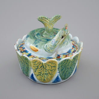 A Dutch Delft polychrome butter tub in the form of a pike, 18th C.