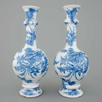 A pair of Dutch Delft blue and white garlic neck vases, 17th C.