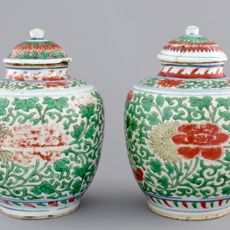 A pair of Chinese wucai porcelain vases with covers, Transitional period, 1620-1683