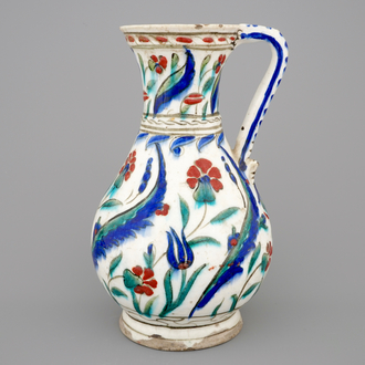 An Iznik jug with gilt decoration, late 16th C.