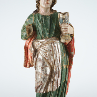 A large polychrome wood figure of John the Evangelist, 17th C.
