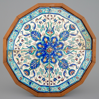 A framed octagonal Iznik style Kutahya tile panel, early 19th C.