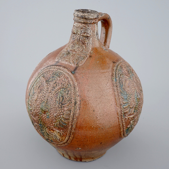 A rare Frechen bellarmine jug with double eagle seals, dated 1604