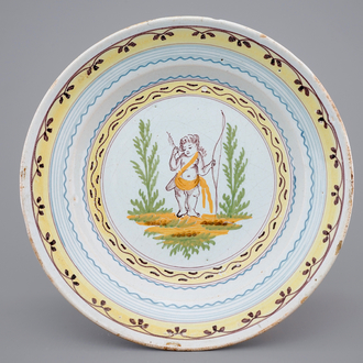 A Brussels faience plate with Cupid with bow and arrows, ca. 1780