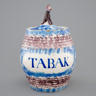 A blue and manganese lidded tobacco jar, Makkum, Friesland, ca. 1850