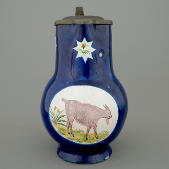 A Brussels faience pewter-mounted jug with a goat, 18th C.