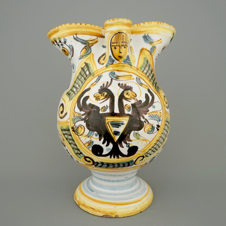 An Italian maiolica armorial jug with double eagle crest, Pesaro, 18th C.