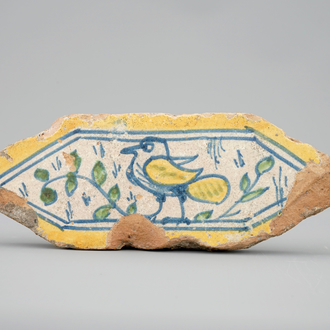 A hexagonal Italian tile with a bird, 16th C.