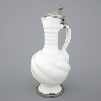 A large white Delft pewter-mounted jug with rope twist handle, 17th C.