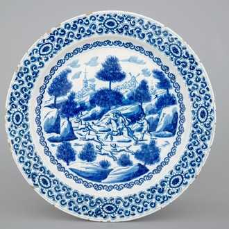 A blue and white Dutch Delft dish depicting a deer hunt, ca. 1700