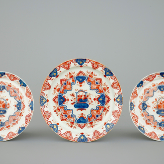 A set of three Dutch Delft doré plates with flower baskets, 18th C.