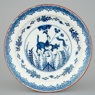 A blue and white Dutch Delft chinoiserie dish, 18th C.