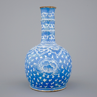 A bottle-shaped Persian style blue ground vase, poss. France, 18/19th C.