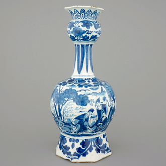 A tall blue and white Dutch Delft garlic neck vase with chinoiserie decoration, ca. 1700