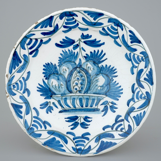 A blue and white maiolica dish with a fruit basket, Friesland, 18th C.