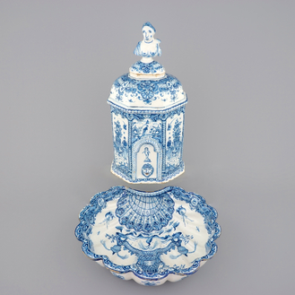 A Dutch Delft blue and white wall cistern with basin, 18th C.