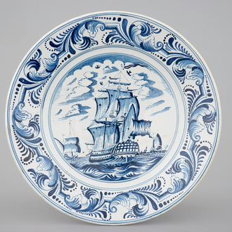 A blue and white dish with a large battle ship, Bolsward, Friesland, 18th C.