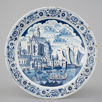 A blue and white dish with a Frisian harbor, Friesland, 18th C.
