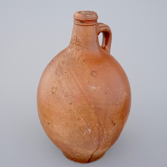 A large brown-glazed stoneware bellarmine jug, 18th C.