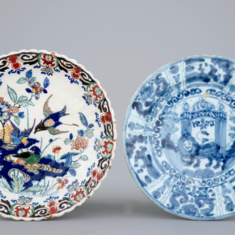 A Dutch Delft polychrome plate with ducks and a blue and white chinoiserie plate, 17/18th C.
