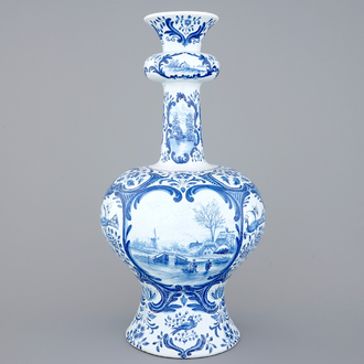 A very tall blue and white Dutch Delft garlic neck vase, Makkum, 19th C.