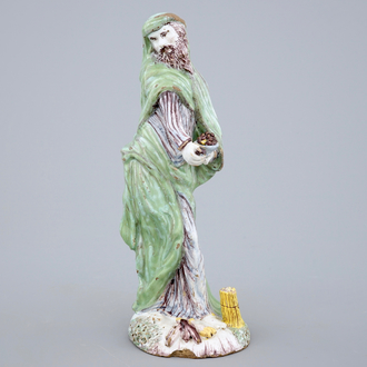 A tall standing figure of a saint, polychrome Dutch Delftware, 18th C.