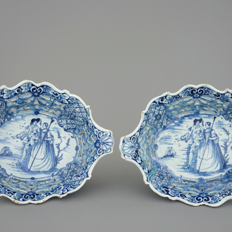 A pair of Dutch Delft blue and white openworked baskets, 18th C.