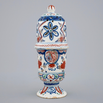 A polychrome Dutch Delft caster with lightning decoration, late 17th C.