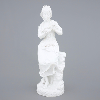 A tall biscuit figure of a country girl, signed G. Lévy, 19/20th C.