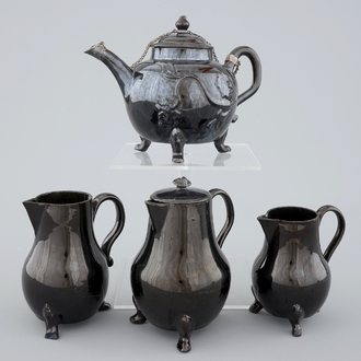 A set of black glazed teapots and jugs in Namur pottery, 18th C.
