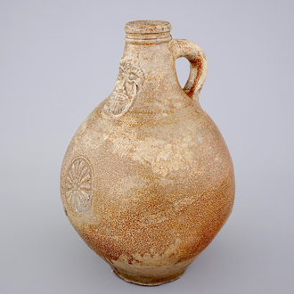 A large brown-glazed stoneware bellarmine jug, 17/18th C.