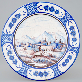 Un plat en bleu, blanc et manganèse au décor d'un paysage, Harlingen, la Frise, 19ème