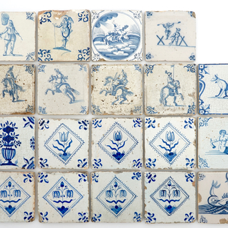 A set of 19 antique Dutch Delft blue and white tiles, 17/18th C.