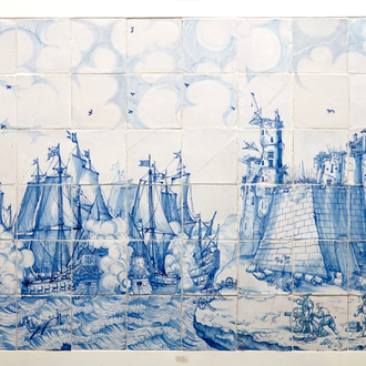 A large Dutch Delft tile panel with a sea coast battle, 17th C.