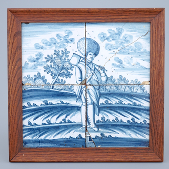 A Dutch Delft tile mural with a cussack with an axe, Harlingen, Friesland, 18th C.