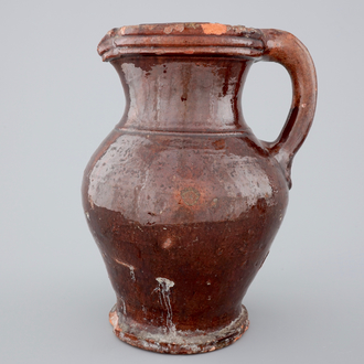 A brown-glazed stoneware jug, France, 18th C.