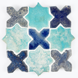 A panel of 9 star- and cross-shaped tiles, Kashan, Central Persia, 13/14th C.