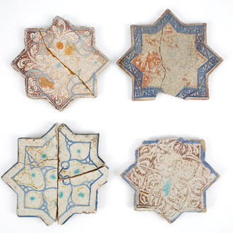 A set of four Kashan star-shaped tiles, Central Persia, 13/14th C.