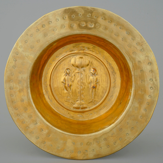 A large broad-rimmed brass alms bowl with Adam and Eve, Nürnberg, 15th C.