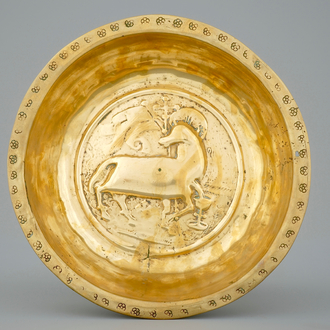 A Nuremberg brass alms bowl depicting the Agnus Dei, 15/16th C.