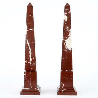 A pair of neo-classical red marble obelisks, 19/20th C.