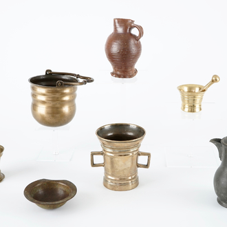 A set of mortars, a holy water bucket, a bleeding bowl and two jugs, 15/19th C.