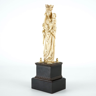 A finely carved ivory figure of Mary with child on base, prob. Dieppe, mid 19th C.
